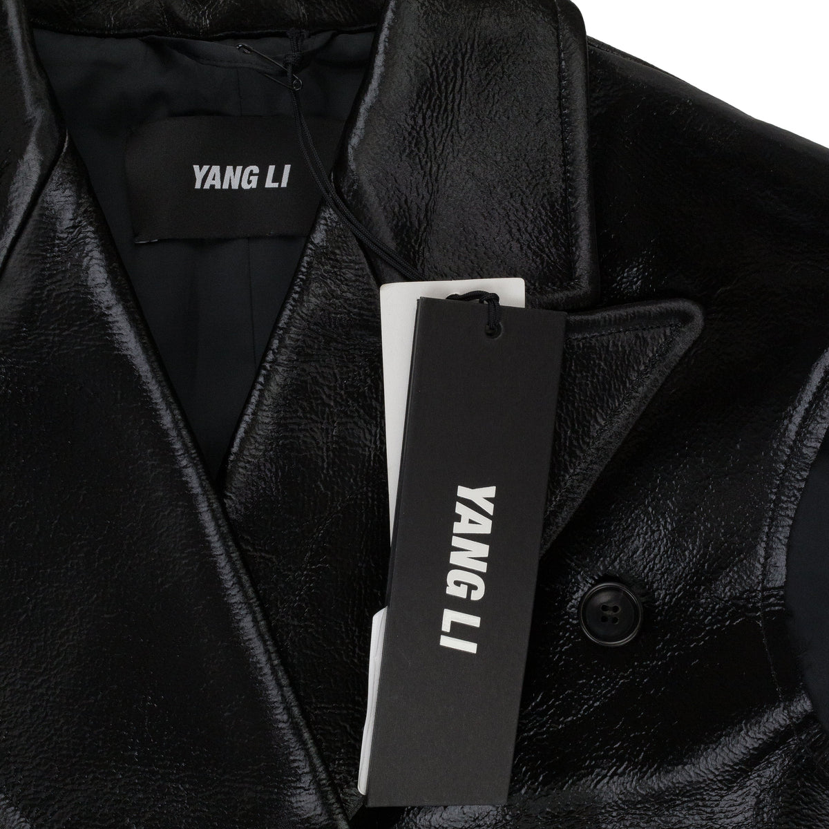 SLEEVELESS BLACK COAT